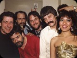Leonard's band from '85.  L to R:  Leonard Cohen, Richard Crooks (drums), John Crowder (bass and vocals), Mitch Watkins (guitar and vocals), Ron Getman (guitar and vocals), Anjani (keys and vocals)