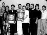 Jennifer Warnes wins a gold record for "Famous Blue Raincoat"