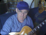 Holding one of Ted Greene's Guild guitars